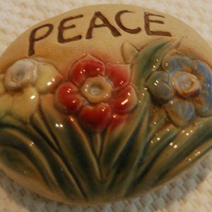 PEACE Pottery Rock With Flowers   4" X 3 1/2 "  No Markings
